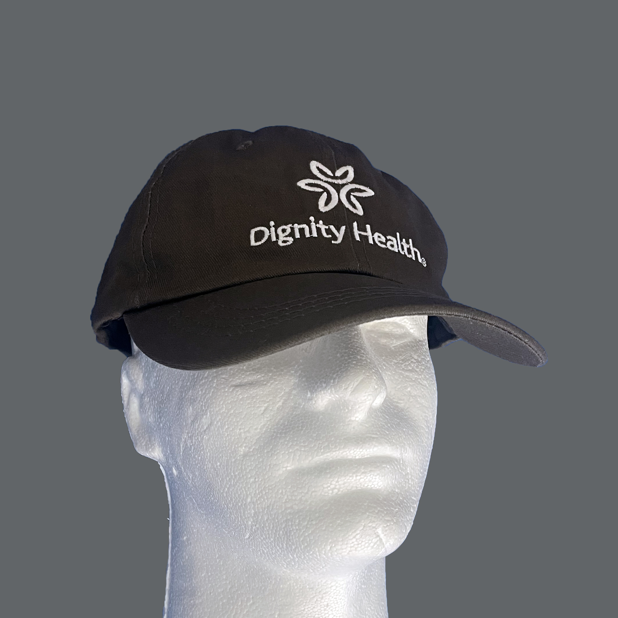 Dignity Health green baseball cap