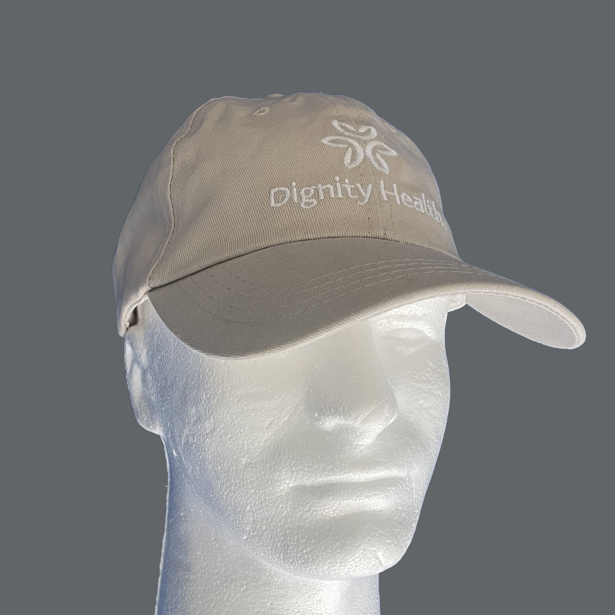 Dignity Health branded tan baseball cap