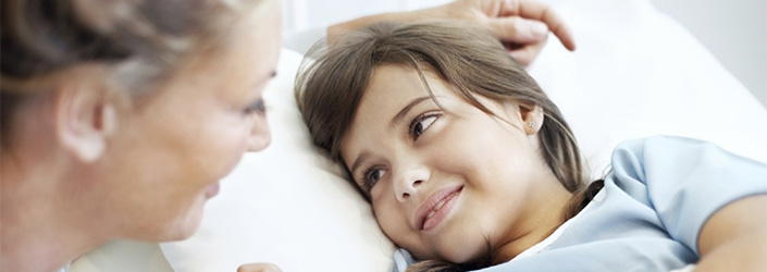 daughter in hospital bed